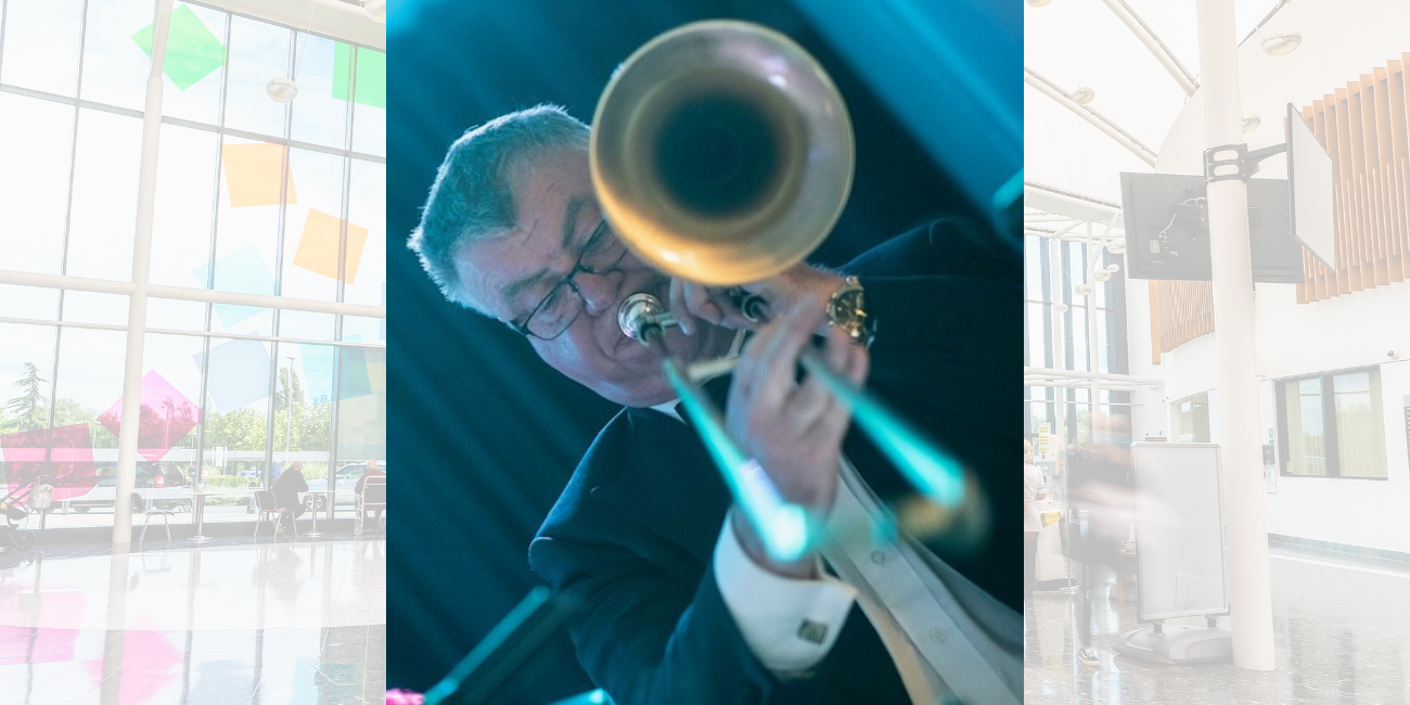 A photo of Trust governor Kevin Stewart playing the trombone